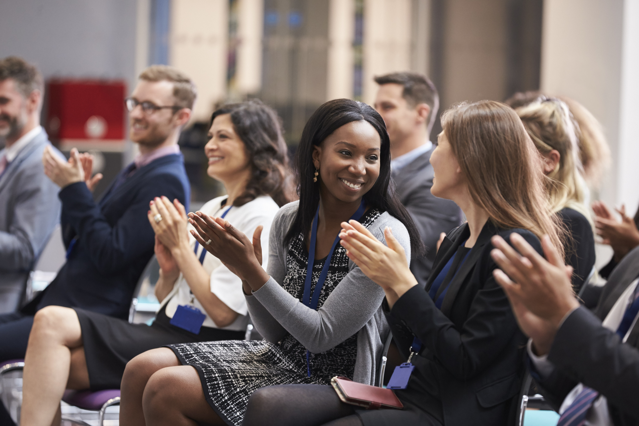 Audience Applauding Speaker After Conference Presentation Attendance